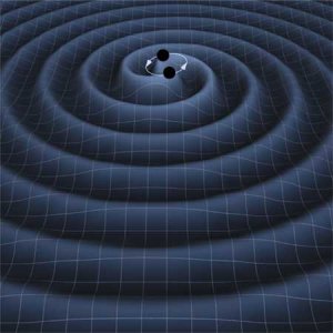 A binary black hole system emitting graviational waves, Credit: T. Carnahan NASA GSFC
